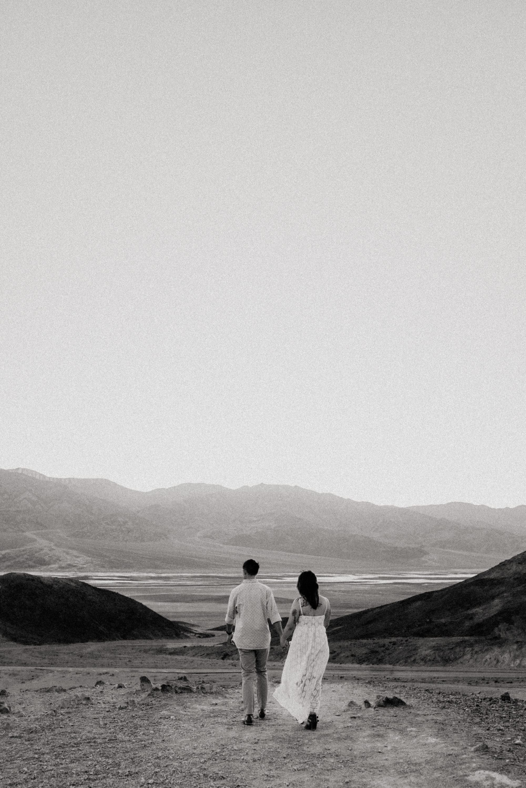 Hand-in-hand, exploring the otherworldly landscapes of Death Valley National Park.
